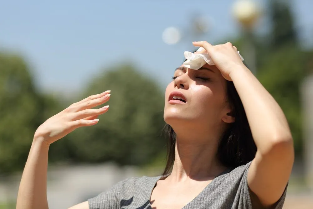 Factors, like, airflow, humidity level, and the cloth you’re wearing (cotton vs nylon) also determine how hot you may feel, along with the ambient temperature.(Credits: Pheelings media/Shutterstock)