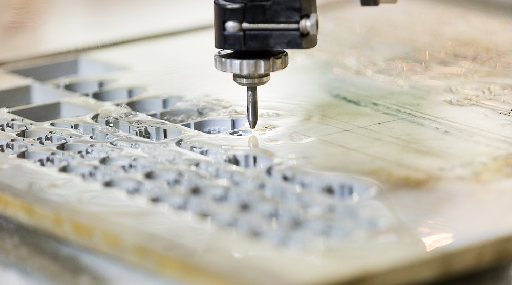Abrasive jet cutting through metal (Credit: Aumm graphixphoto/Shutterstock)
