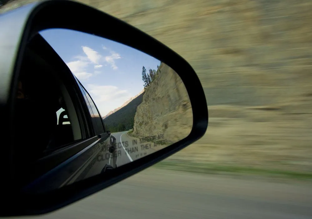 Why 'Objects In The Mirror Are Closer Than They Appear'?