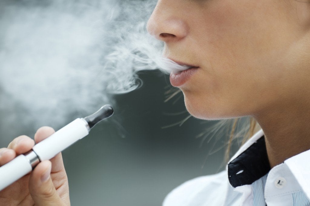 E-cigarette Smoking (Photo Credit: diego cervo / Fotolia)