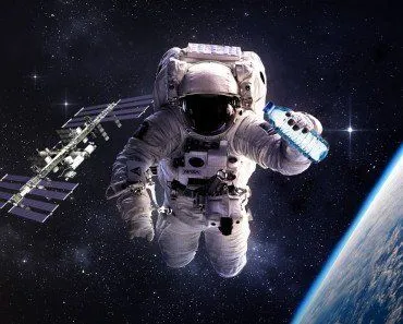 Astronaut & water bottle in space