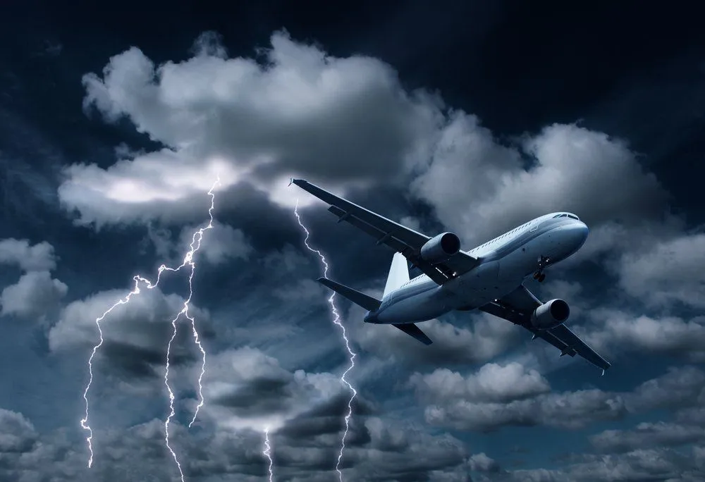 aeroplane yielding turbulent thunderstorm and lightnings