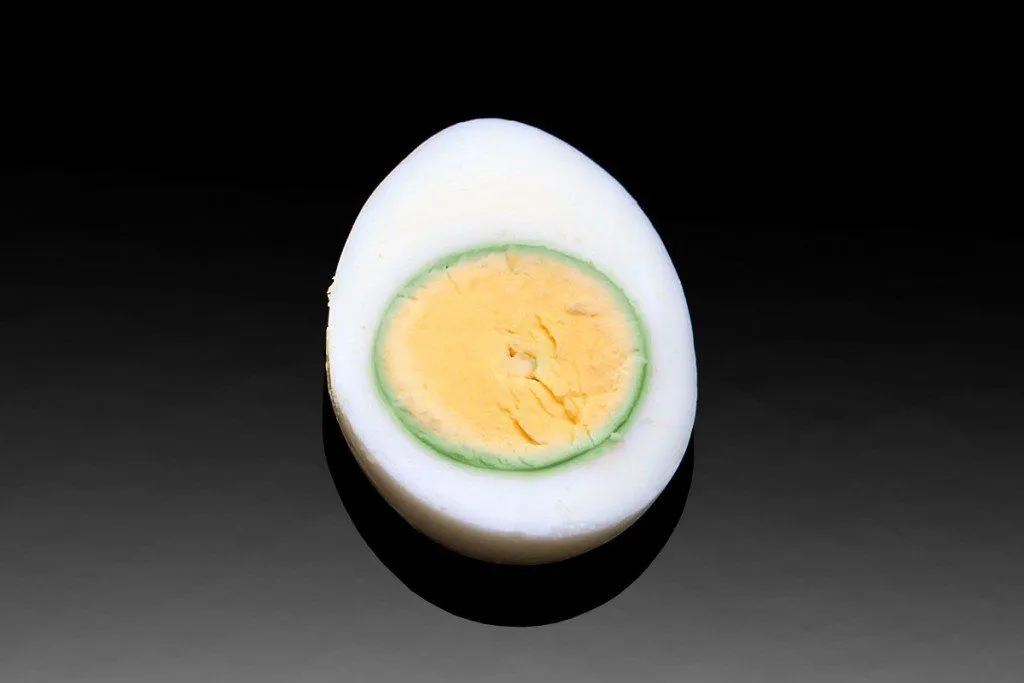 Why Does The Yolk Of An Overcooked Hard-Boiled Egg Become Green?