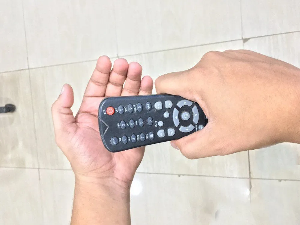 Slapping a (faulty) TV remote sometimes makes it work.