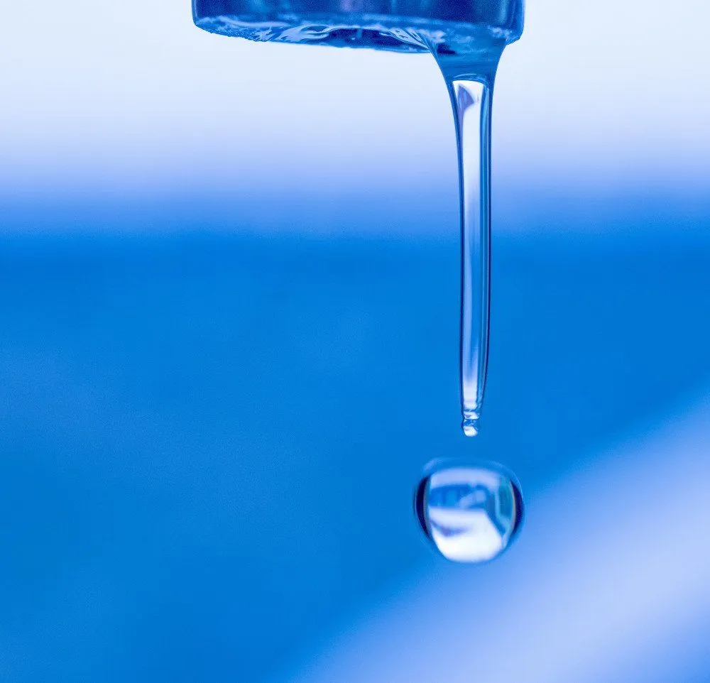 The shape of a water droplet is due to cohesion amongst water molecules. As it turns out,surface tension, an often talked-about property of water, is also a result of the tendency of water molecules to attract one another (Source).