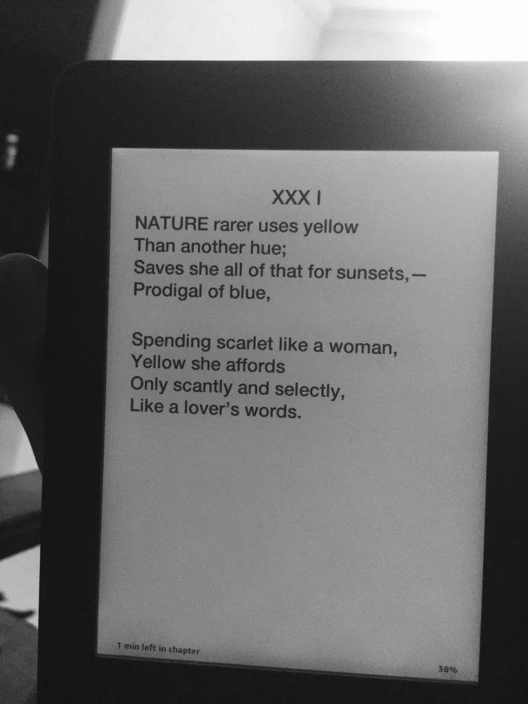 Emily Dickinson’s “Nature rarer uses yellow” on my Kindle Paperwhite.