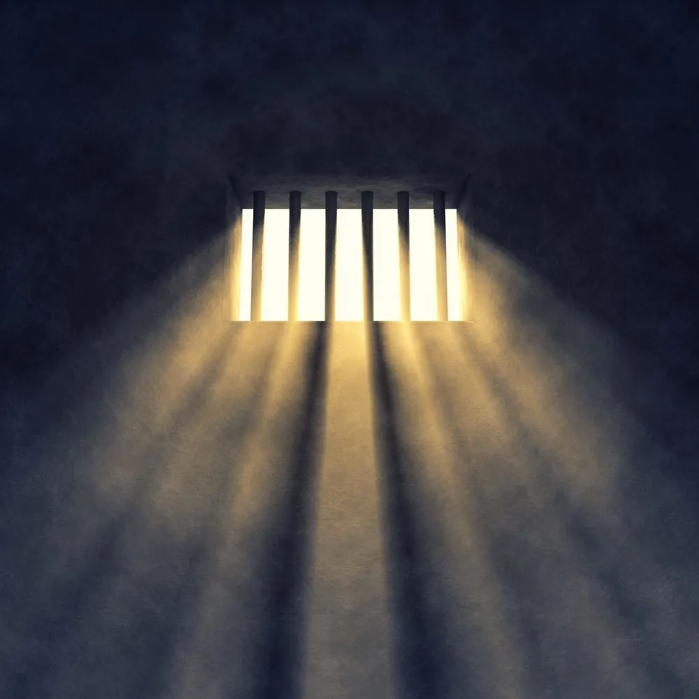 Prison cell interior , sunrays coming through a barred window - Illustration(nobeastsofierce)S