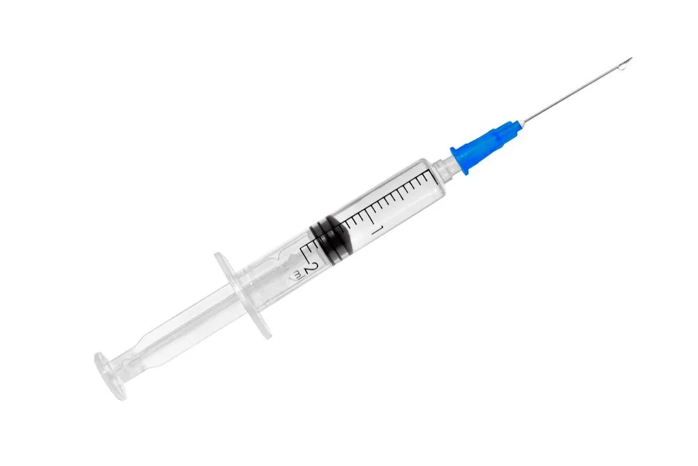 Syringe with a transparent vaccine isolated on white background. High resolution. Closeup - Image(MAKOVSKY ART)s