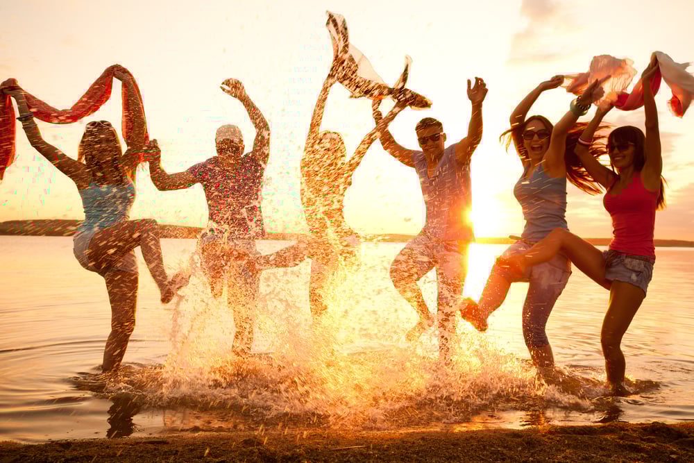 Large group of young people enjoying a beach party - Image(YanLev)S