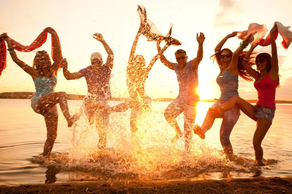 Large group of young people enjoying a beach party - Image(YanLev)S