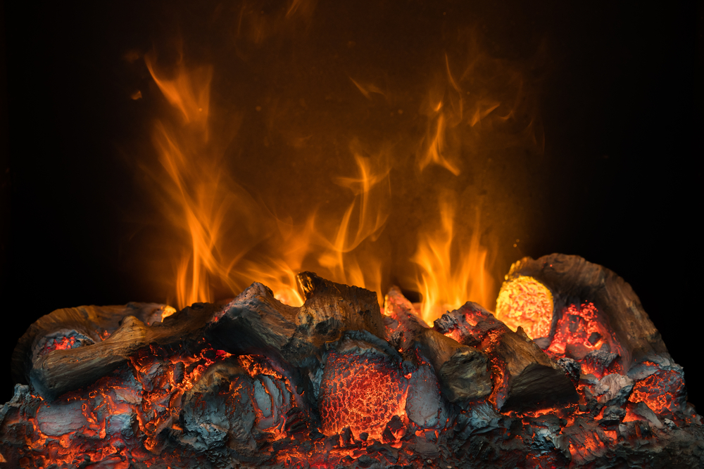 Fire flame burning coal and wood in fireplace( Buncha Lim)s