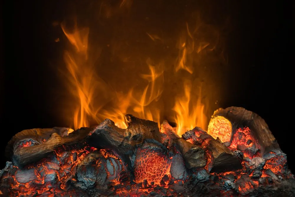 Fire flame burning coal and wood in fireplace( Buncha Lim)s