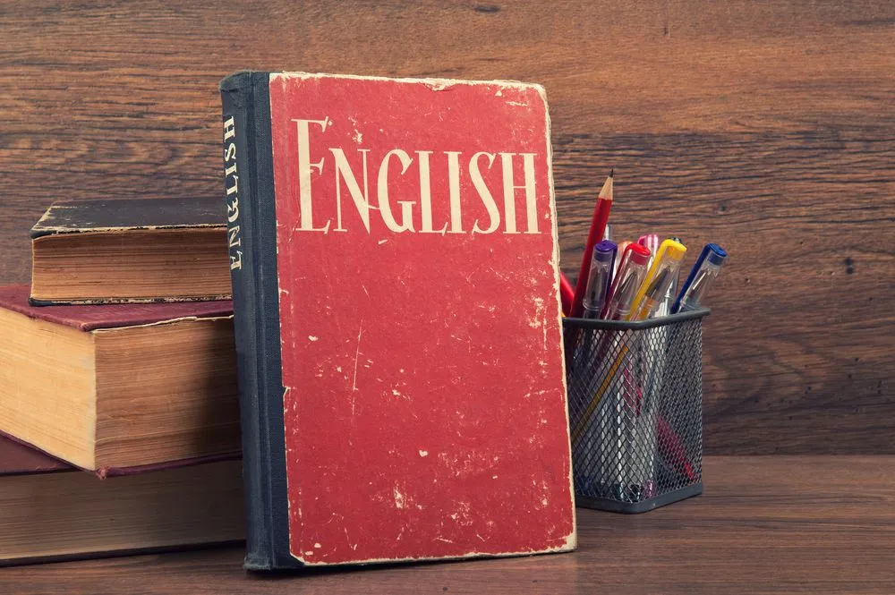 learning english concept. book on a wooden background(spaxiax)s