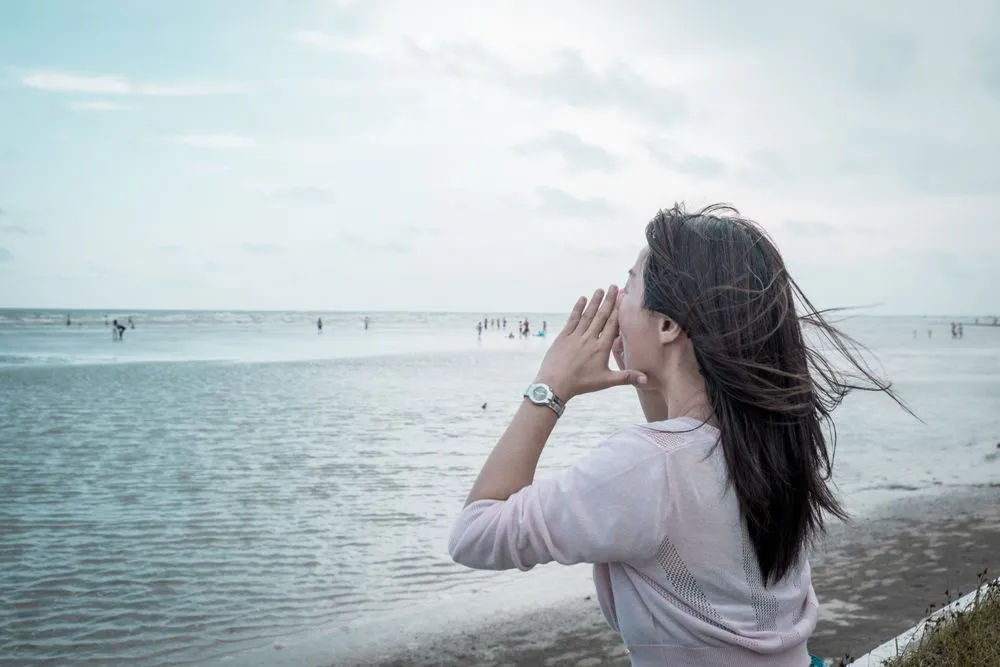 shouting on the shore feeling relax and free with the wind from the sea(mantinov)s