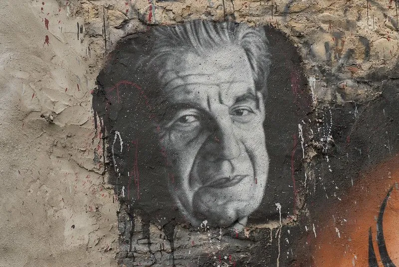 A painted portrait of Jacques Lacan