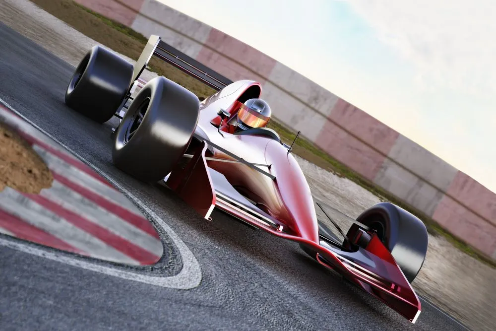 Race car racing into a turn on a track with motion blur(Digital Storm)s