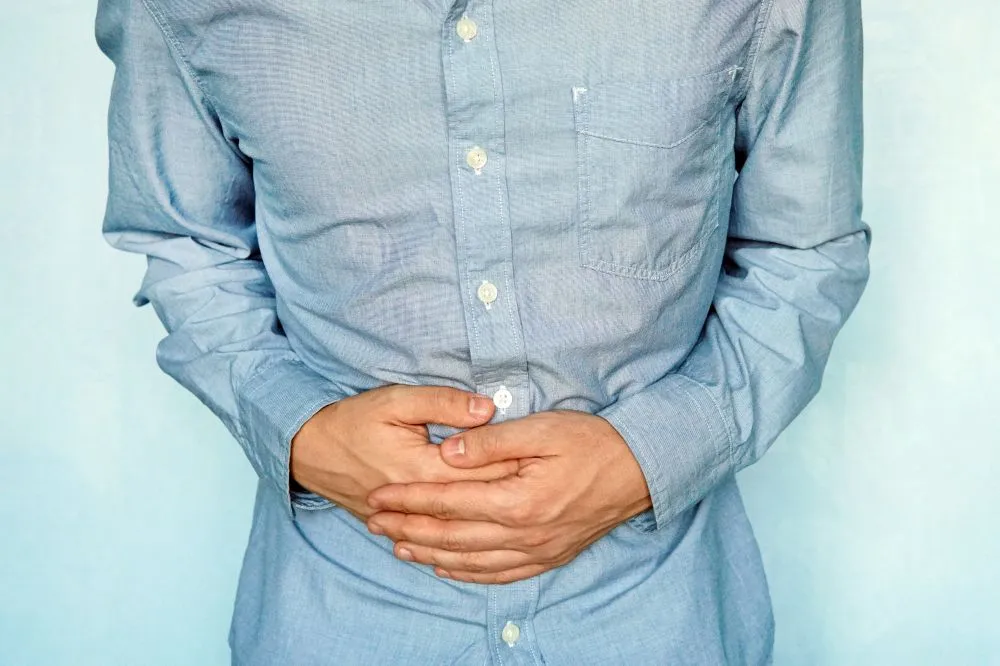 Businessman holding his stomach in pain(diy13)s