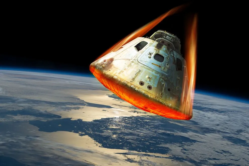 A,Space,Capsule,Reenters,The,Earths,Atmosphere,Causing,The,Heat