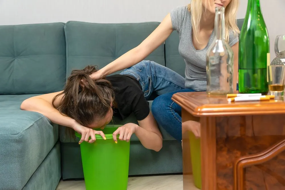 Dark-haired,Young,Woman,Is,Lying,On,The,Sofa,,She,Is