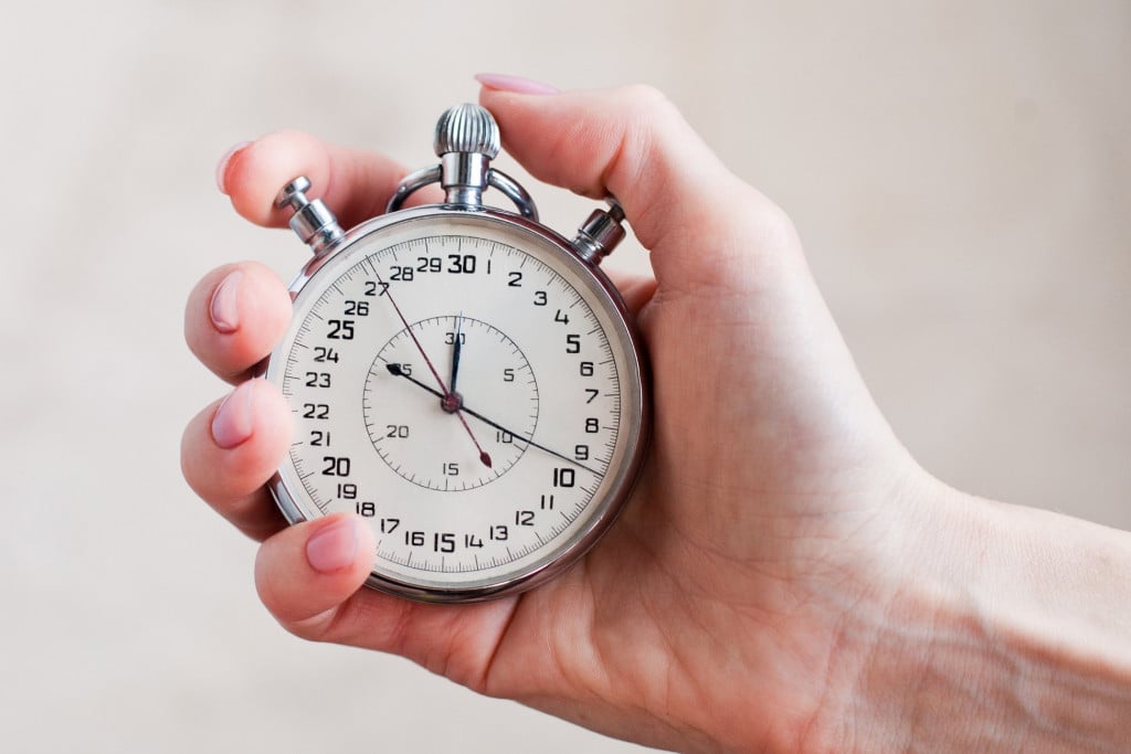 Stopwatch in a woman's hand. Close-up