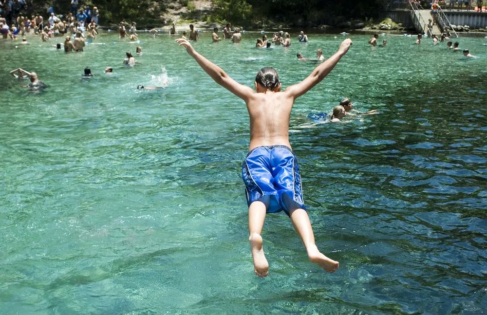 A,Boy,Belly,Flops,Into,The,Spring.