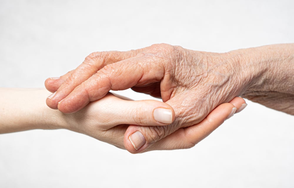 Old,Wrinkled,Hand,Lies,On,The,Young,Hand.,Care,For