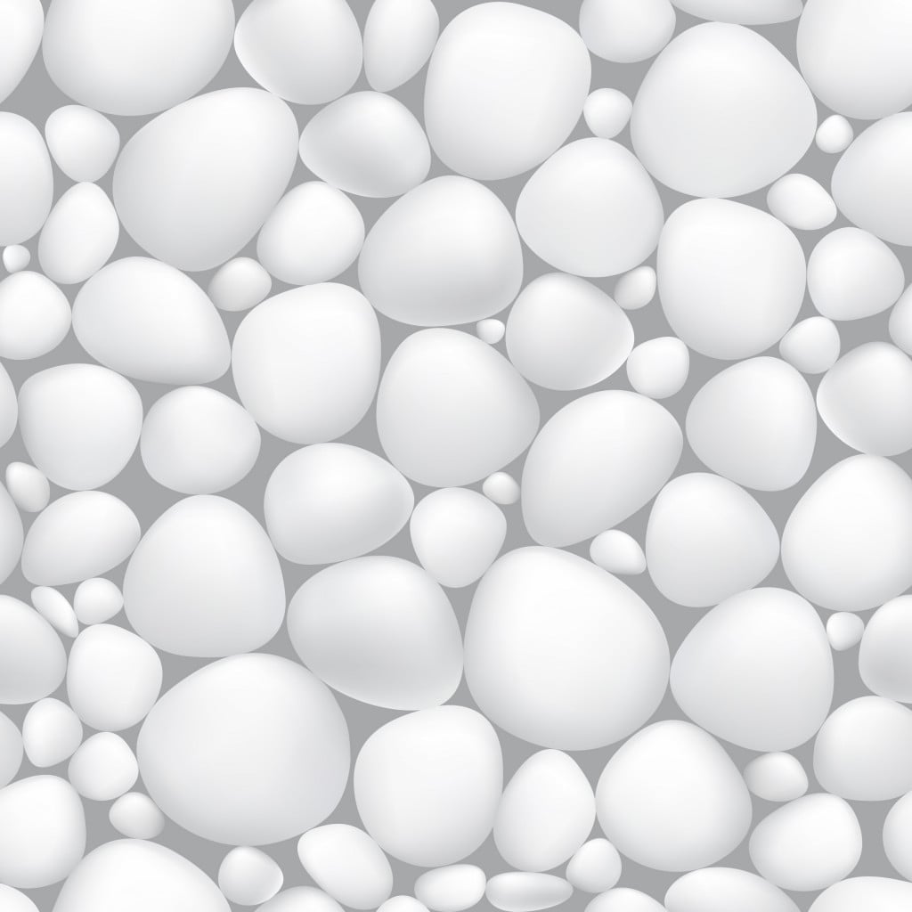 Seamless White Stone Wall Pattern Textured Background with Round Pebbles and Rocks