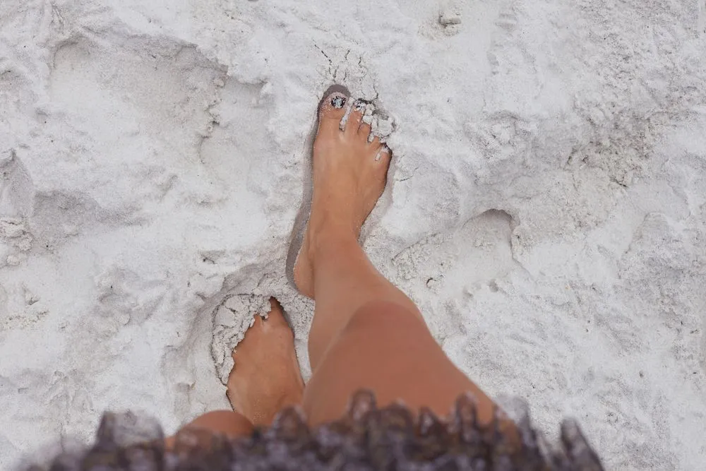 The,Hyams,Beach,australia.,Shot,Of,Tanned,Girl's,Legs,Drowning,Is