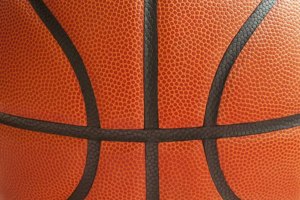 Close,Up,Shot,Of,A,Basketball,Showing,The,Black,Seams