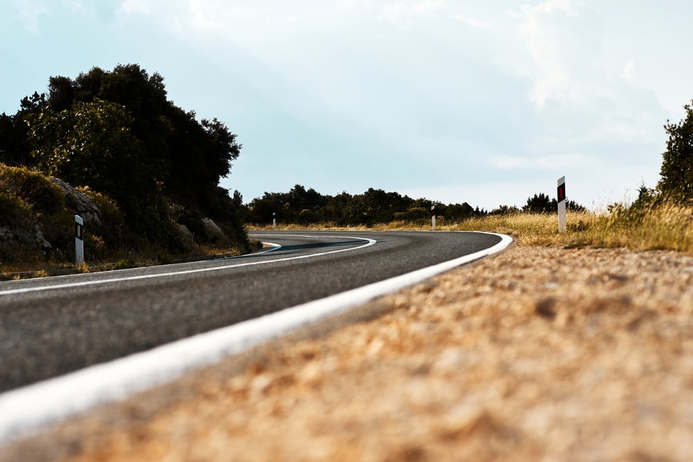 Scenic,View,On,The,Gravel,Road,With,Stones,And,Vegetation