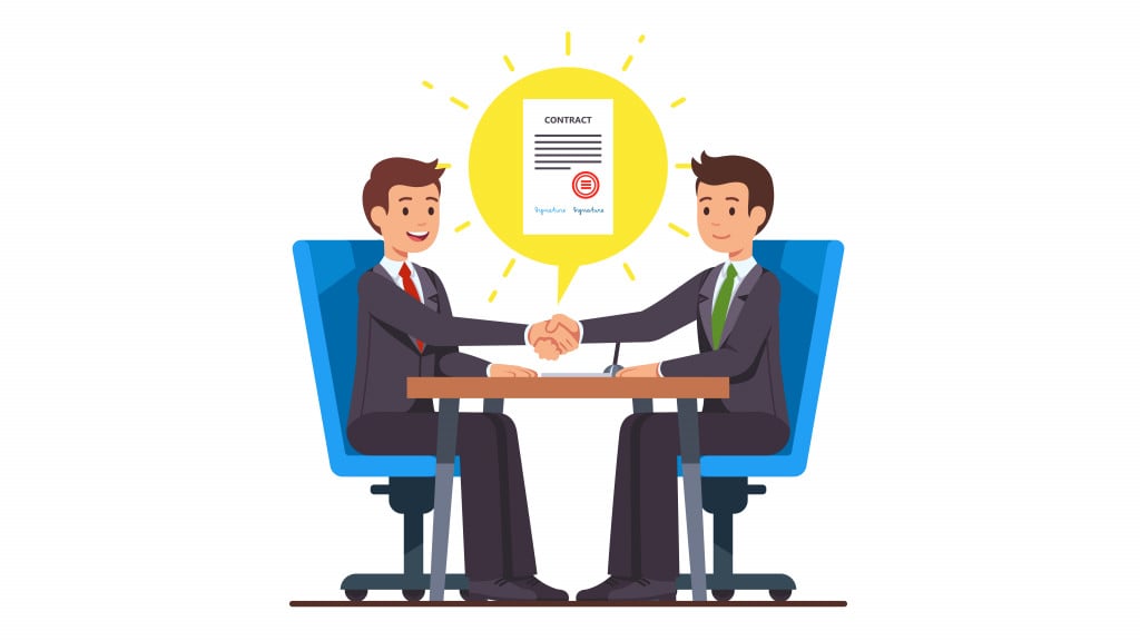 Business man partnership beginning. Businessman partners shaking hands after signing contract agreement closing deal sitting at negotiations table