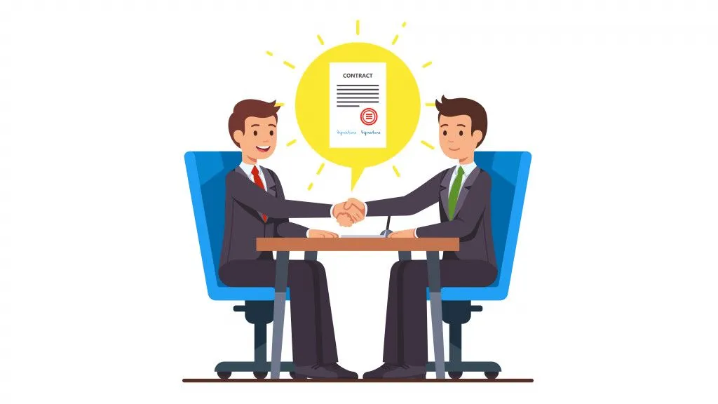 Business man partnership beginning. Businessman partners shaking hands after signing contract agreement closing deal sitting at negotiations table