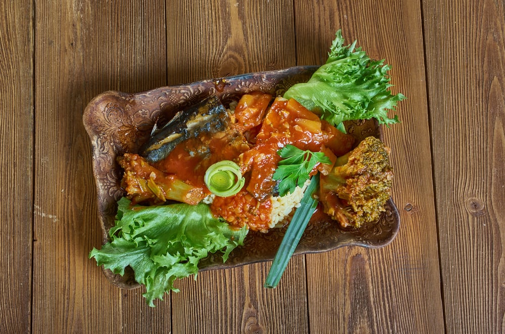 Coo-Coo and Flying Fish, national dish of Barbados, cornmeal and okra porridge