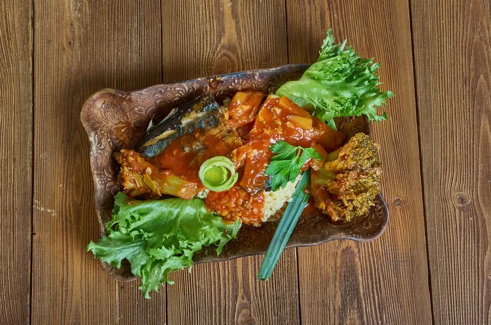 Coo-Coo and Flying Fish, national dish of Barbados, cornmeal and okra porridge