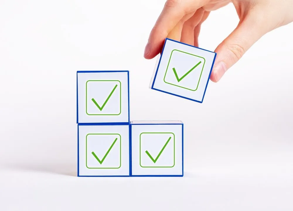 Affirmative,Unanimous,Decisions,Making.,Hand,Holding,Cube,With,Check,Mark.