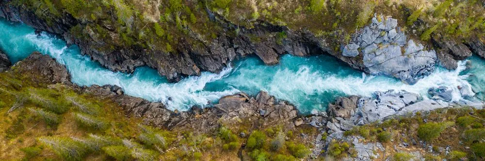 Aerial,Vertical,View,Over,The,Surface,Of,A,Mountain,River