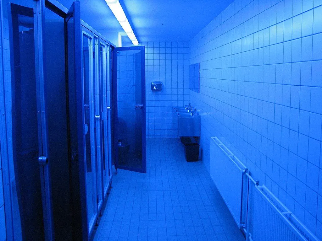 Blue light in a bathroom to limit intravenous drug use. (Source: Wikimedia Commons)