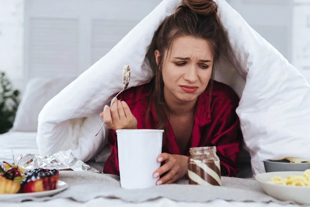 One of the body’s response to stress is to indulge in calorific treats, referred to as the “Comfort food hypothesis” (Credits: YAKOBCHUK VIACHESLAV/Shutterstock)
