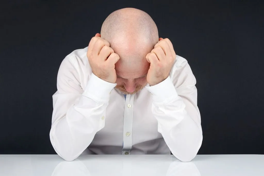 Stress acts as a catalyst and aids in baldness (Credits: photosaint/Freepik)