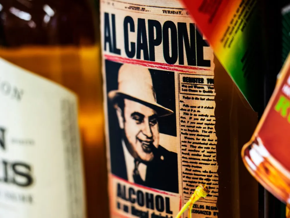 Gangsters like Al Capone made huge profits while the federal treasury suffered. (Credits: IgorGolovniov/Shutterstock)