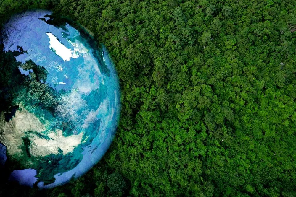 Aerial view of Earth over green forests (Credits: Me dia/Shutterstock)